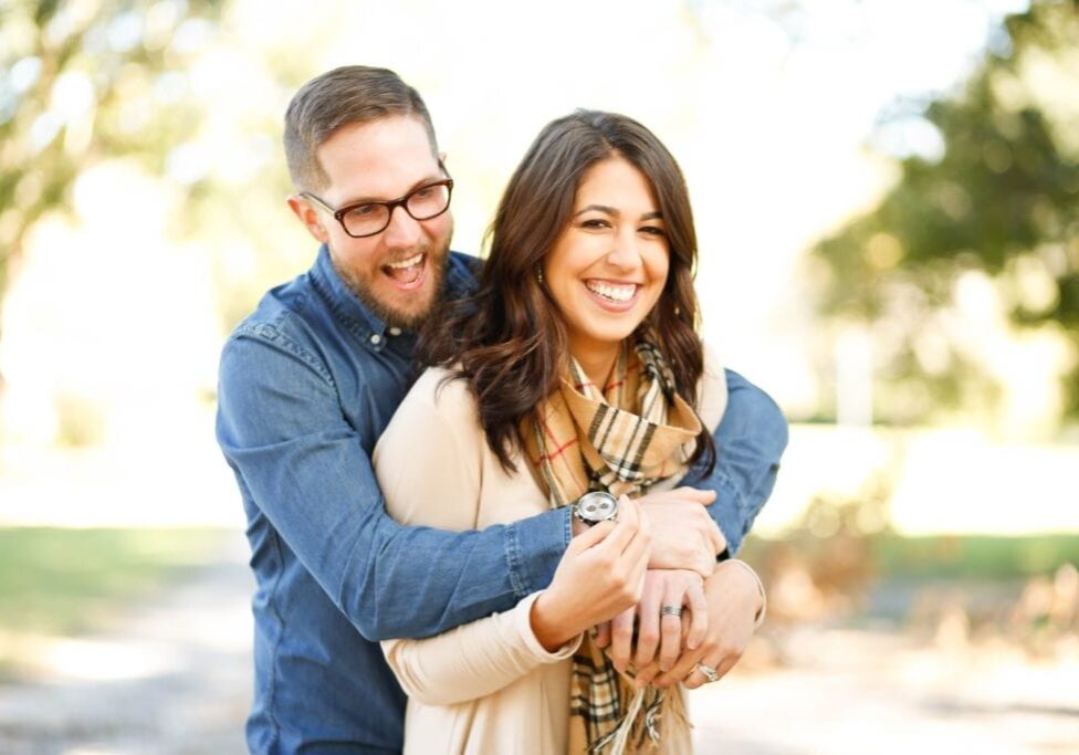 portrait of smiling couple on a sunny day